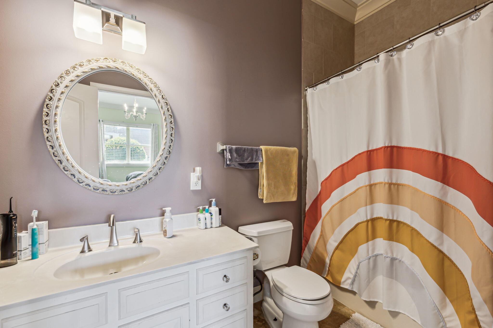 8 Weekewachee Circle Destin, FL 32541 - Photo 30 of 33 a bathroom with a sink a mirror a toilet and a mirror