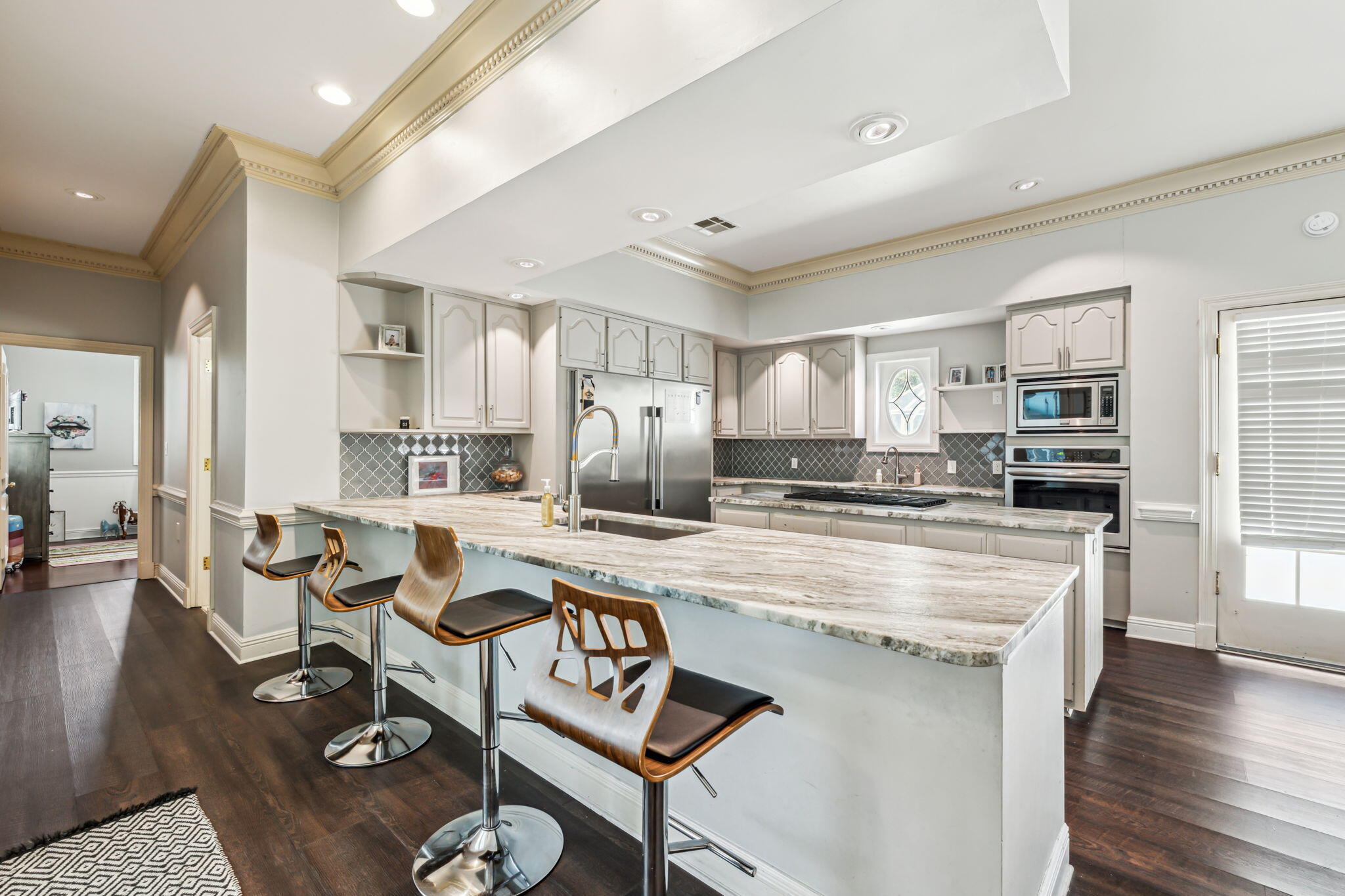 8 Weekewachee Circle Destin, FL 32541 - Photo 8 of 33 a large kitchen with a table and chairs in it