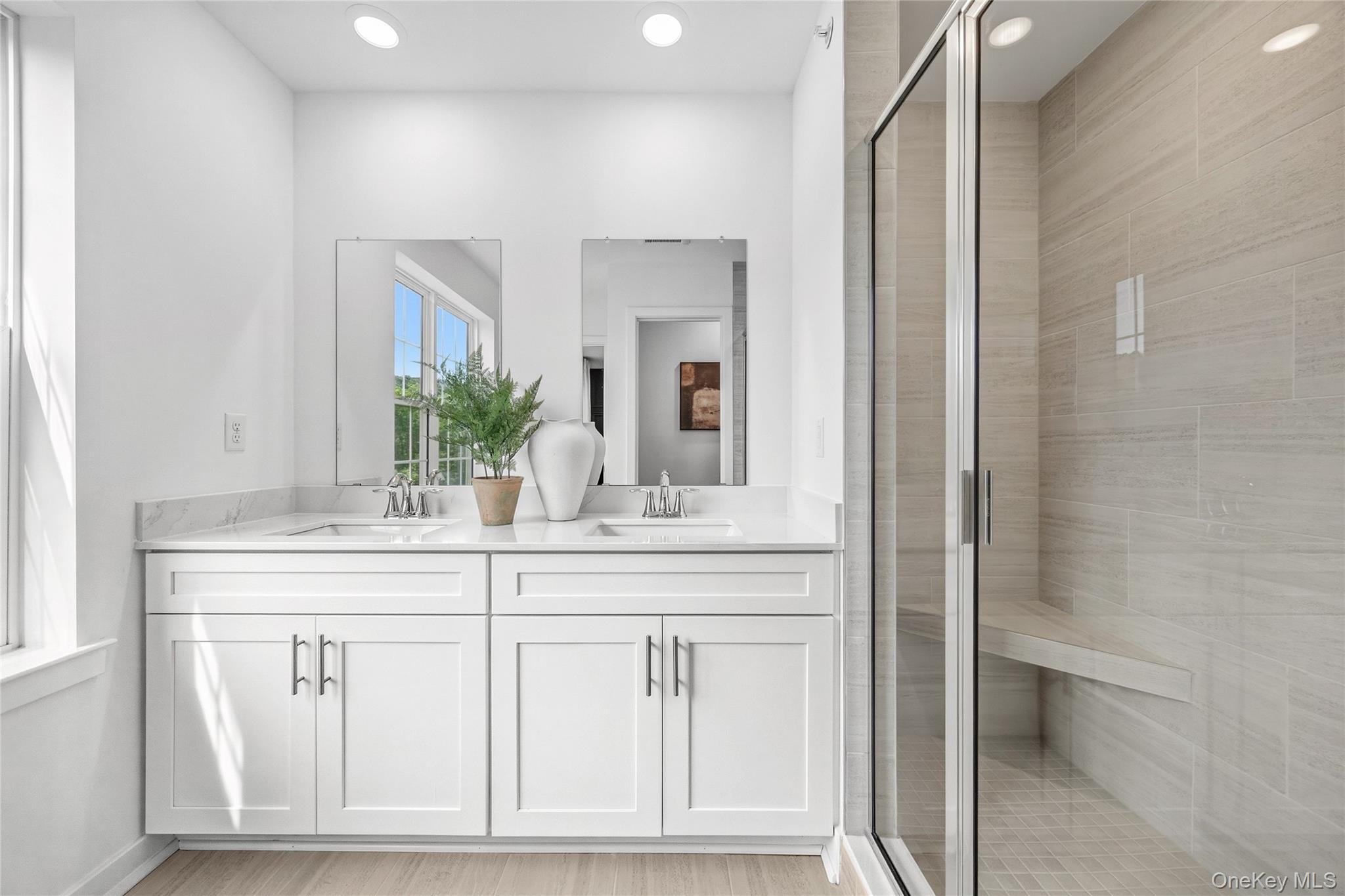 154 Pine Ridge Road Tuxedo Park, NY 10987 - Photo 19 of 25 a bathroom with a sink and a mirror