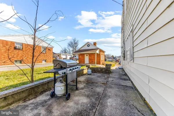 a view of a terrace with sitting area