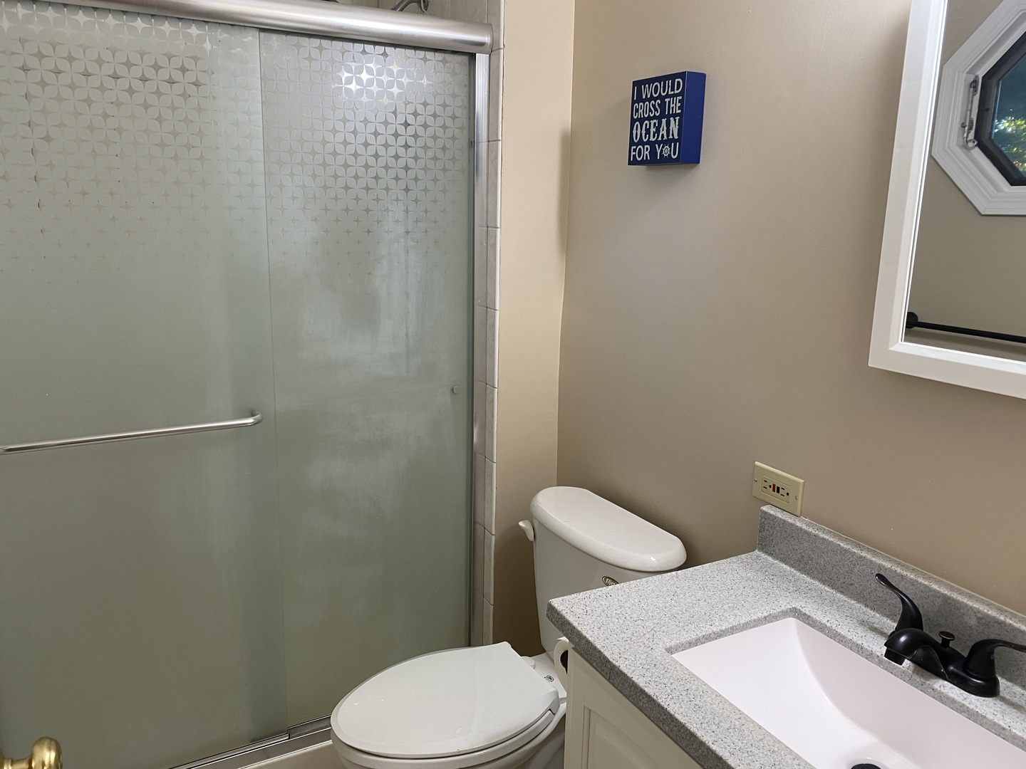 10 Briar Lane Geneva, IL 60134 - Photo 20 of 35 a white toilet sitting next to a bathroom sink