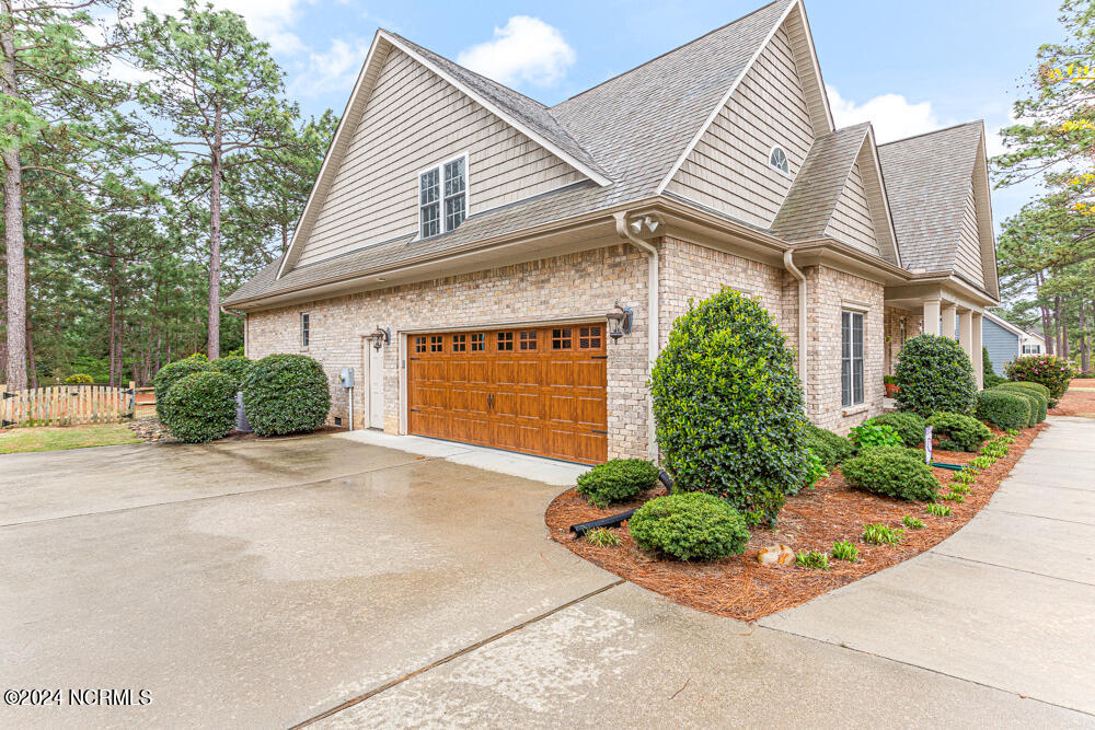157 Longleaf Drive West End, NC 27376 - Photo 27 of 58 Oversized 2 car side entry garage