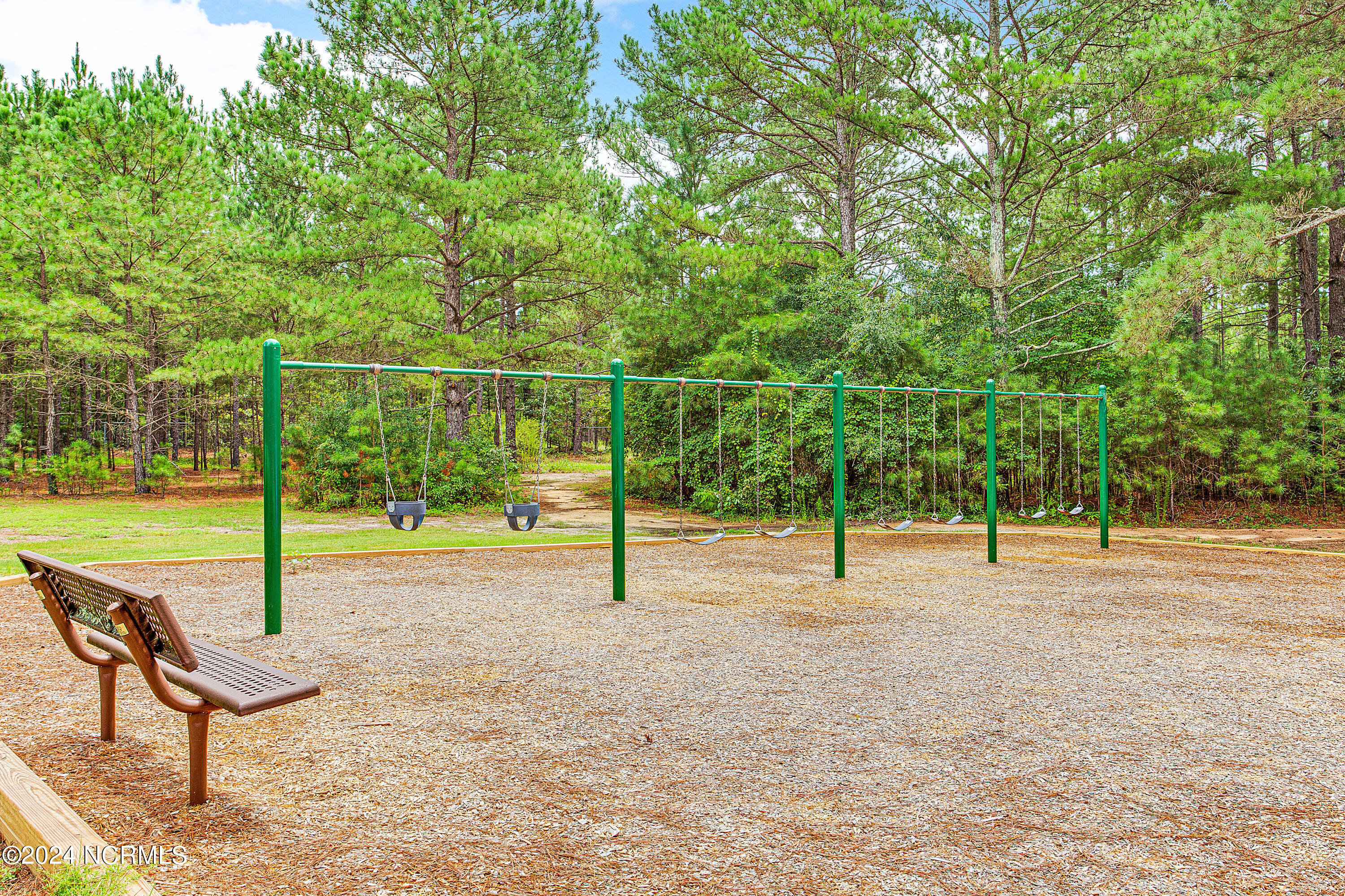 157 Longleaf Drive West End, NC 27376 - Photo 52 of 58 Seven Lakes West - playground