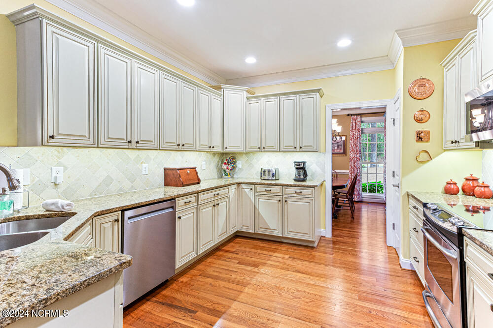 157 Longleaf Drive West End, NC 27376 - Photo 6 of 58 Granite counter tops, pantry & SS appliances