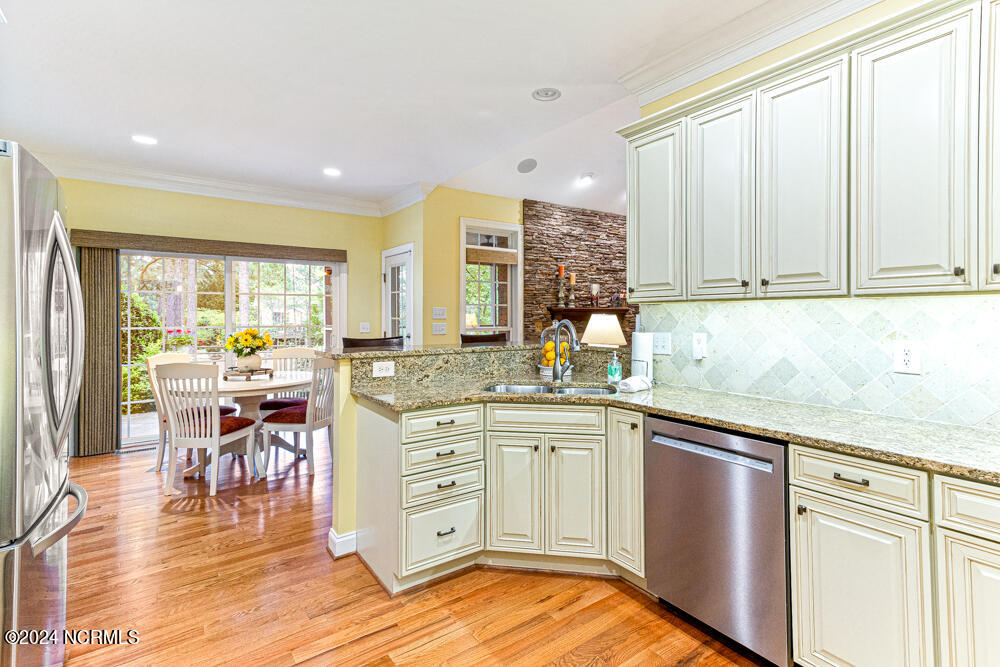 157 Longleaf Drive West End, NC 27376 - Photo 7 of 58 breakfast bar and under cabinet lighting