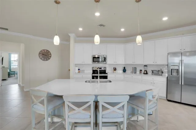 a dining room with furniture window and outside view