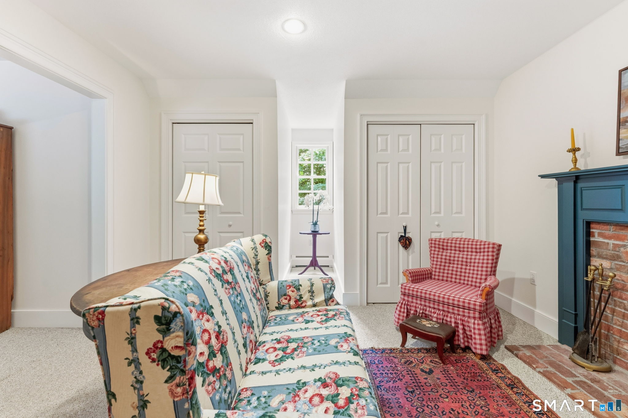 276 Stratton Brook Road Simsbury, CT 06092 - Photo 30 of 40 Sitting room with plenty of closets