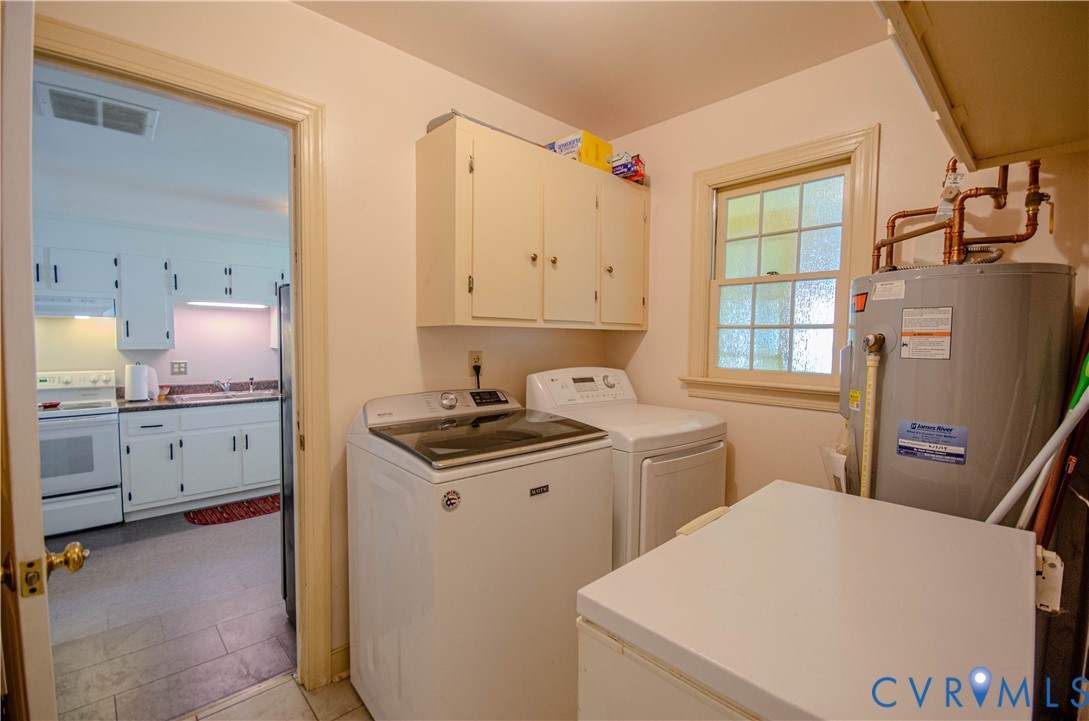 12500 Musical Lane Midlothian, VA 23113 - Photo 35 of 51 Laundry area featuring upper cabinetry, a window,