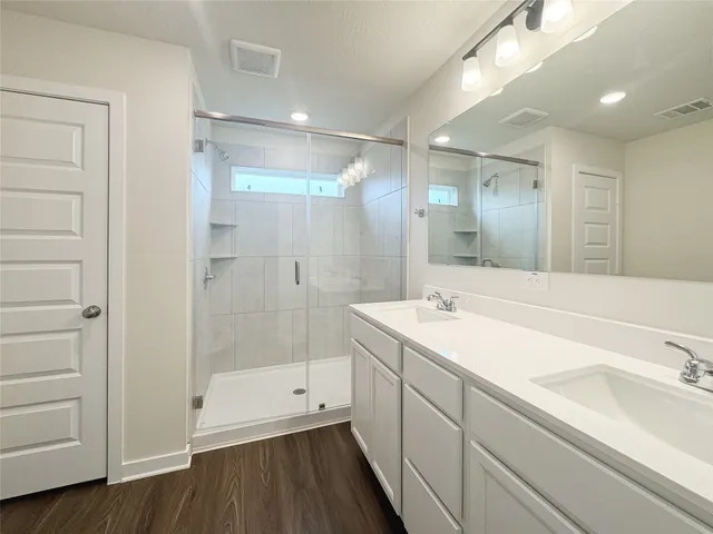 an empty room with a hallway and closet