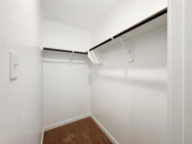 a view of small space with racks on the wall