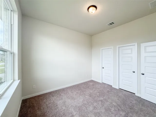 a bathroom with a sink toilet vanity and tub