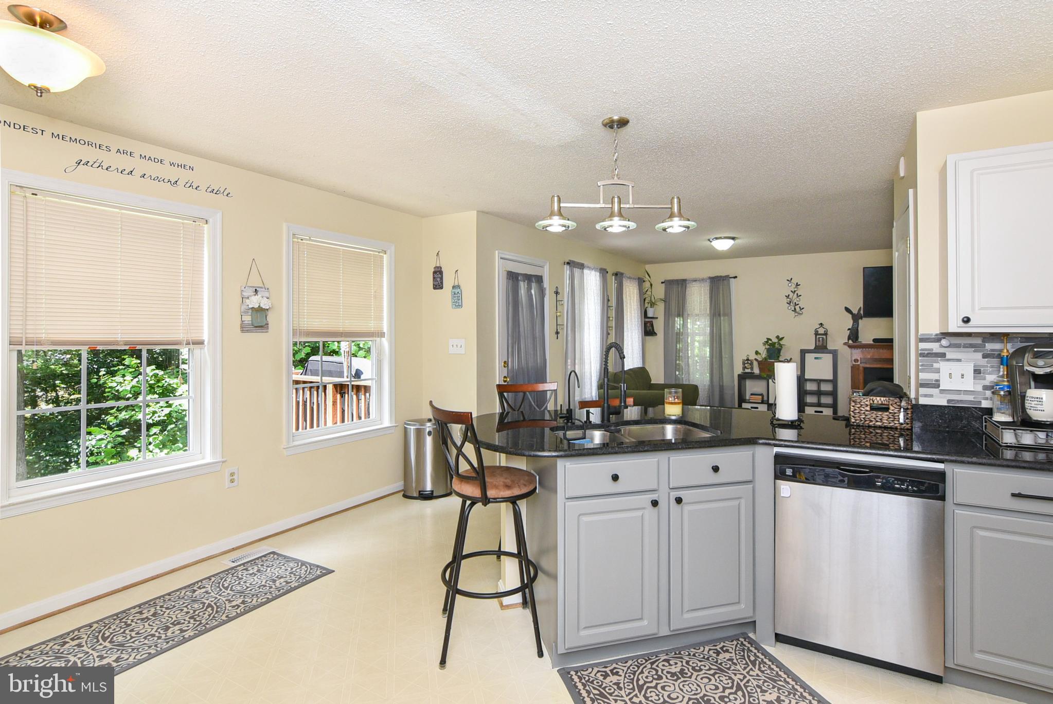 6053 Igo Road King George, VA 22485 - Photo 13 of 44 Kitchen/Living View w/Walk Out to Upper Back Deck