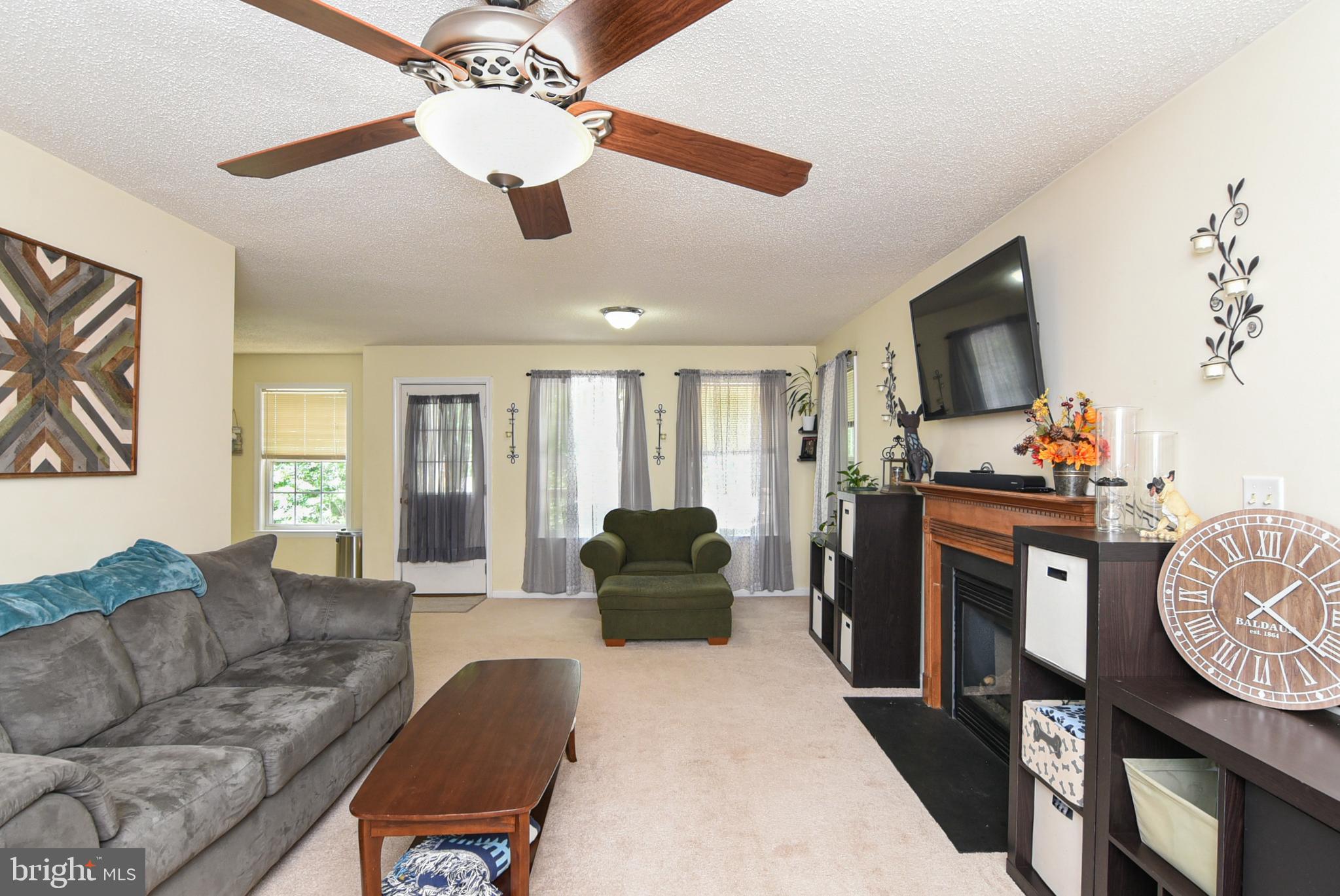 6053 Igo Road King George, VA 22485 - Photo 5 of 44 Living Room with Ceiling Fan
