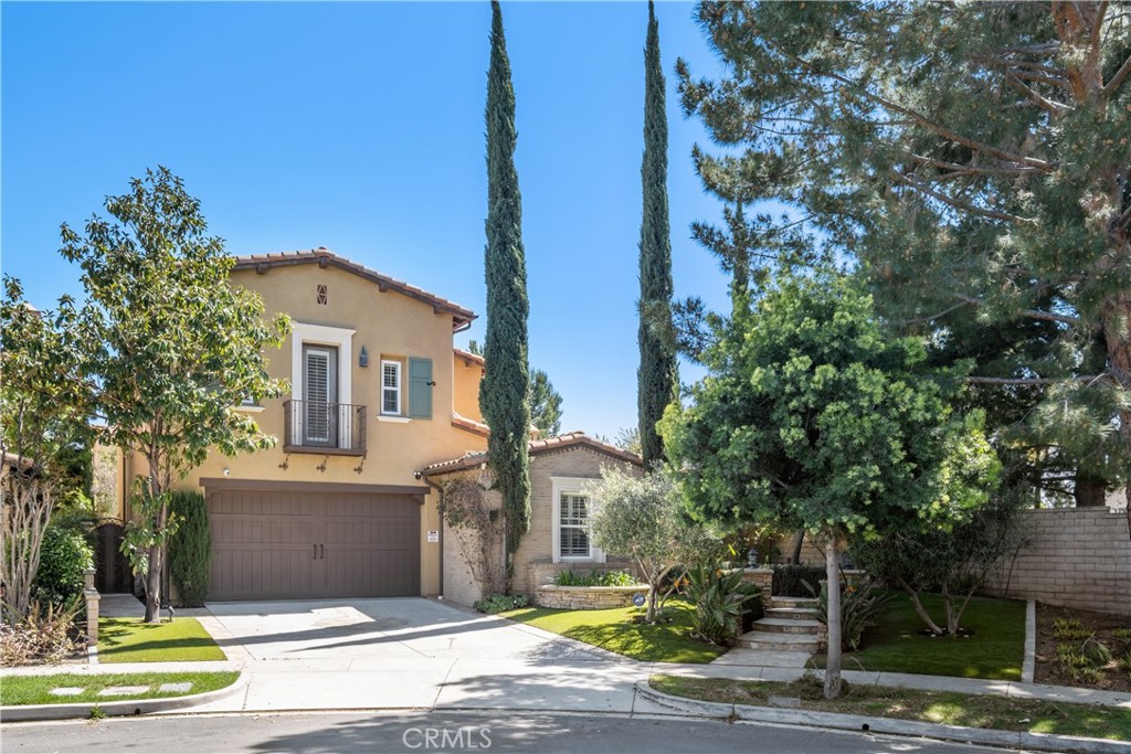 20 Lookout Irvine, CA 92620 - Photo 1 of 1 a front view of a house with a yard and garage