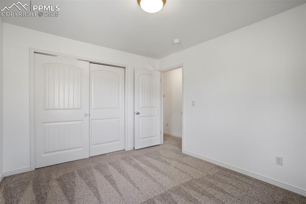 1571 Promontory Bluff View Colorado Springs, CO 80921 - Photo 26 of 49 a view of an empty room
