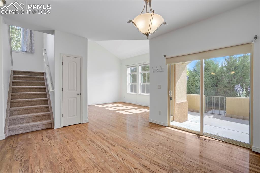 1571 Promontory Bluff View Colorado Springs, CO 80921 - Photo 49 of 49 a view of empty room with wooden floor and fan