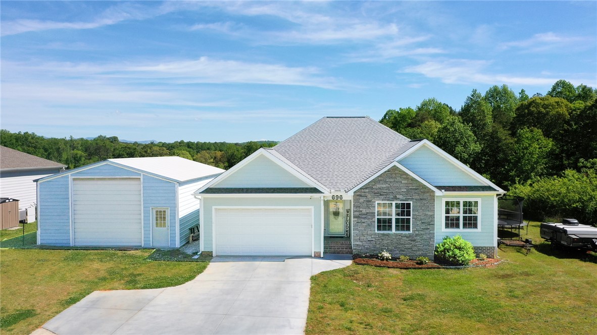696 Mt Olivet Road Six Mile, SC 29682 - Photo 1 of 35 This charming home offers a perfect blend of comfort and style with its attractive exterior.