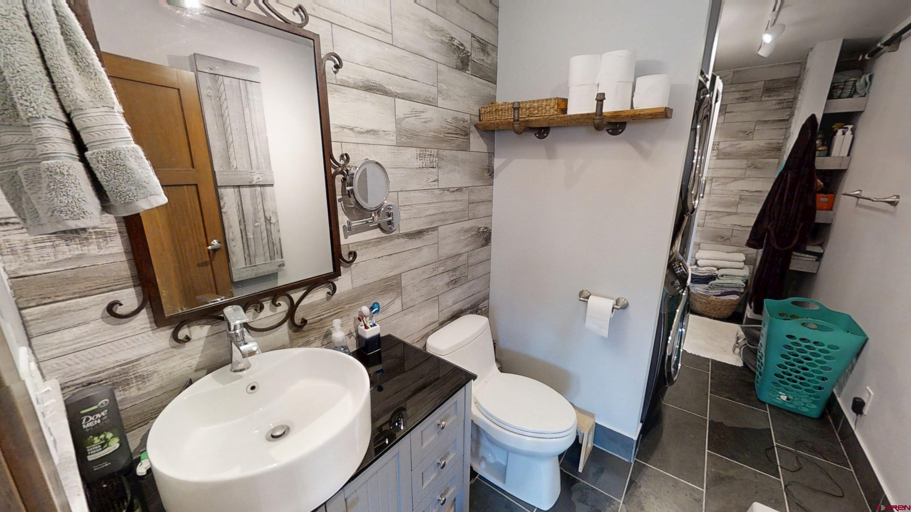 315 East 8th Avenue, Unit 203 Durango, CO 81301 - Photo 10 of 15 a bathroom with a sink toilet and shower