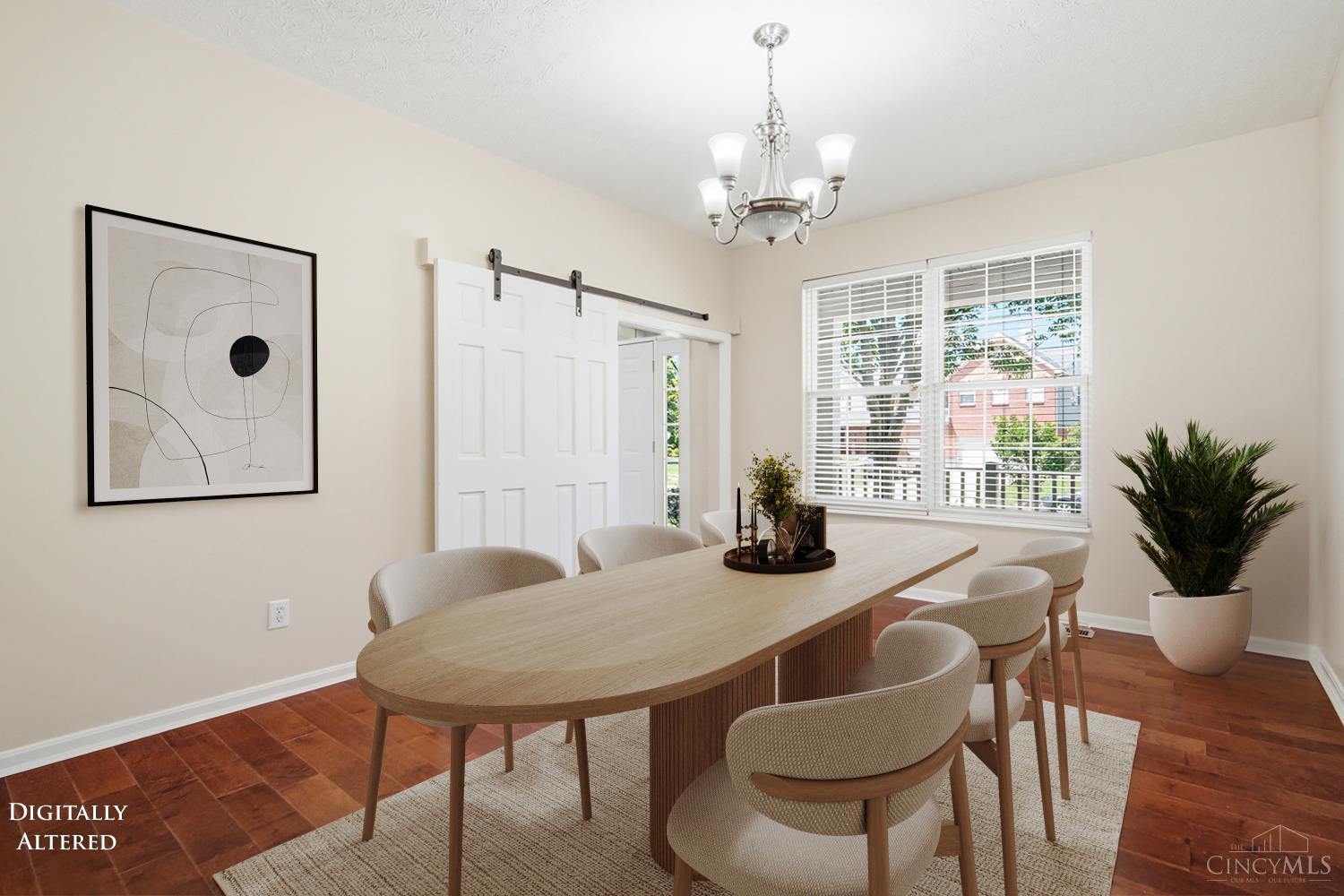 4431 Springfield Lane Mason, OH 45040 - Photo 10 of 52 Beautiful dining room featuring a stylish sliding barn door that adds character and charm