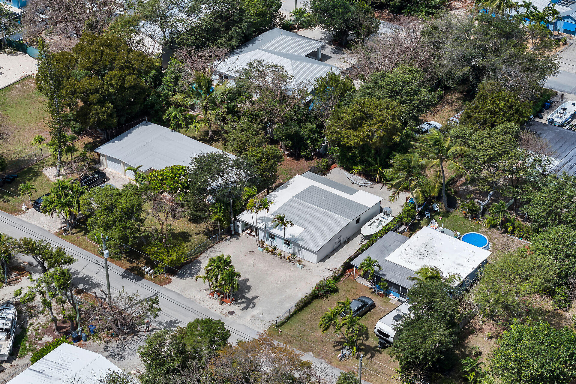 10 Dolphin Road Key Largo, FL 33037 - Photo 3 of 55 an aerial view of a house with outdoor space and a street view