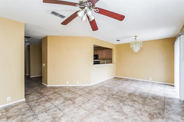 a view of a room with a flat screen tv