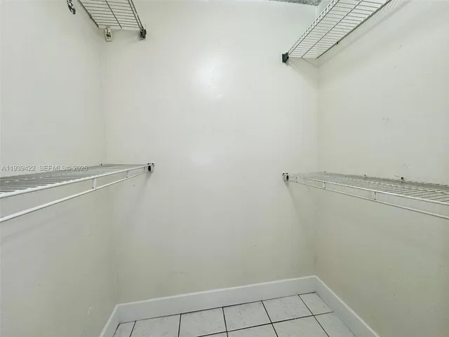 a view of a room with racks on the wall