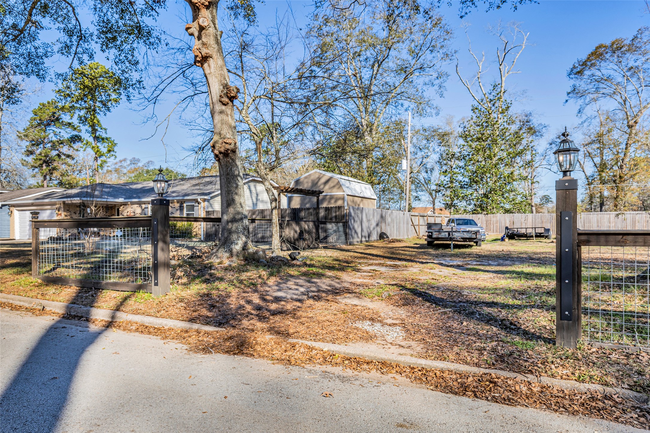 25473 White Oak Lane Splendora, TX 77372 - Photo 22 of 24 Second lot completely fenced