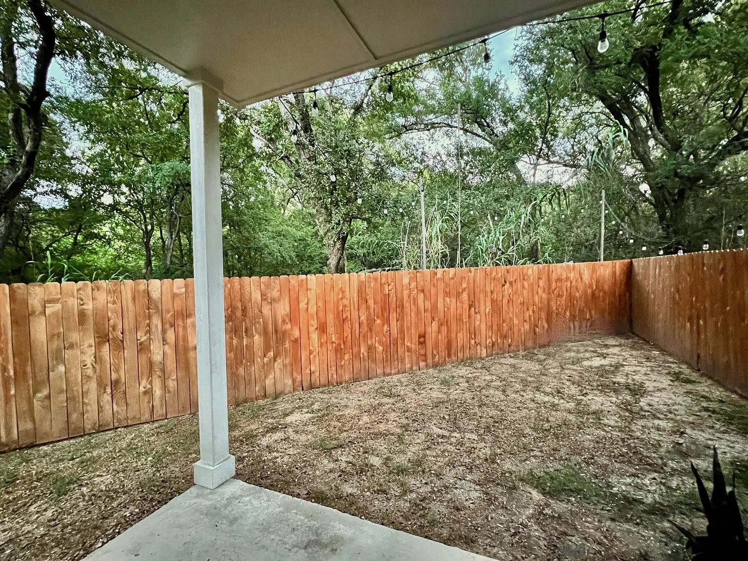 1924 Bunche Road, Unit A Austin, TX 78721 - Photo 14 of 14 Fenced backyard featuring a patio area