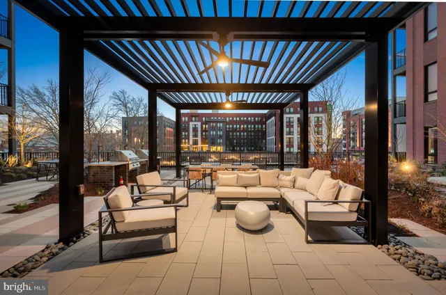 a outdoor space with patio the couches and pool view