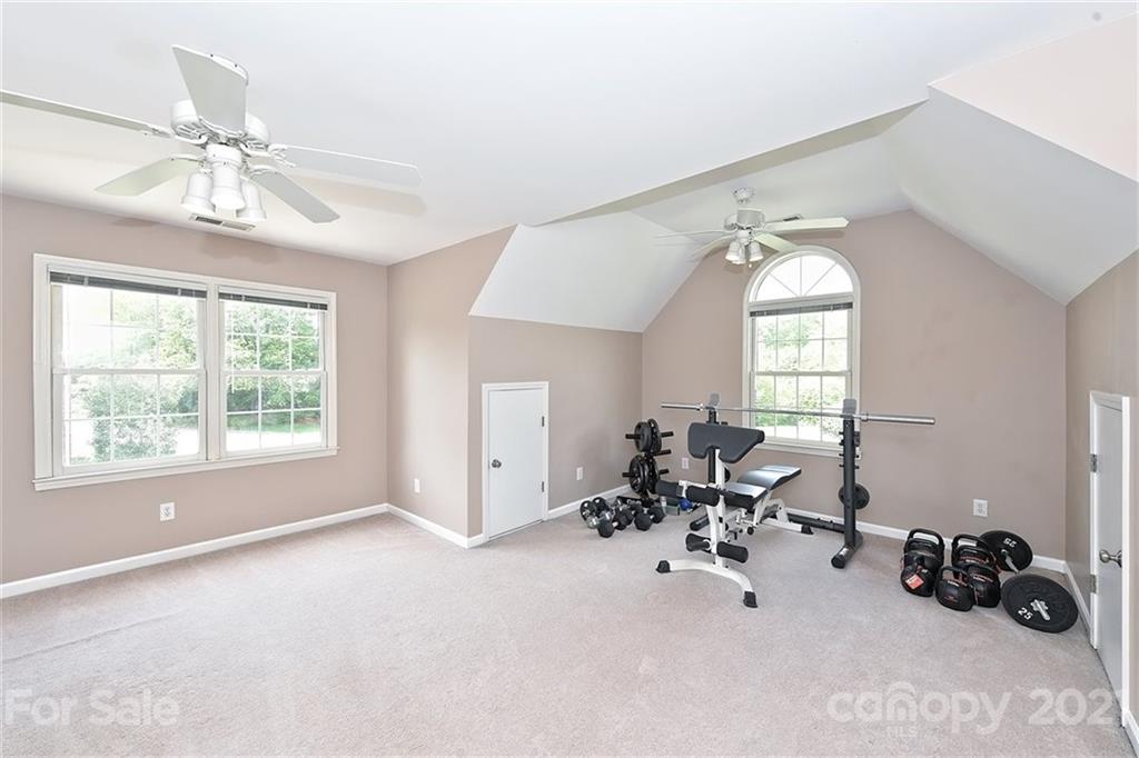 324 Gringley Hill Road Fort Mill, SC 29708 - Photo 26 of 48 a view of a livingroom with workspace and a window