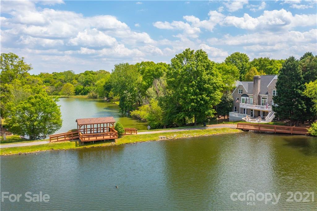324 Gringley Hill Road Fort Mill, SC 29708 - Photo 43 of 48 a view of a swimming pool with a yard