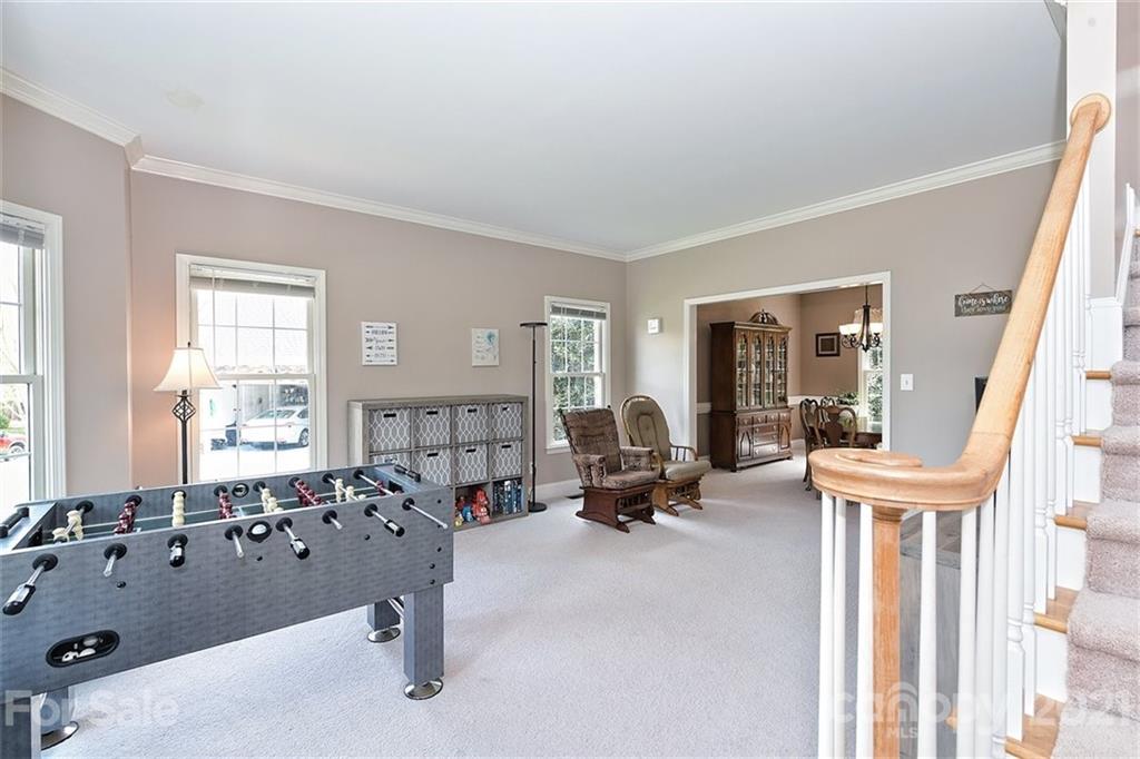 324 Gringley Hill Road Fort Mill, SC 29708 - Photo 5 of 48 a view of a livingroom with furniture and a window