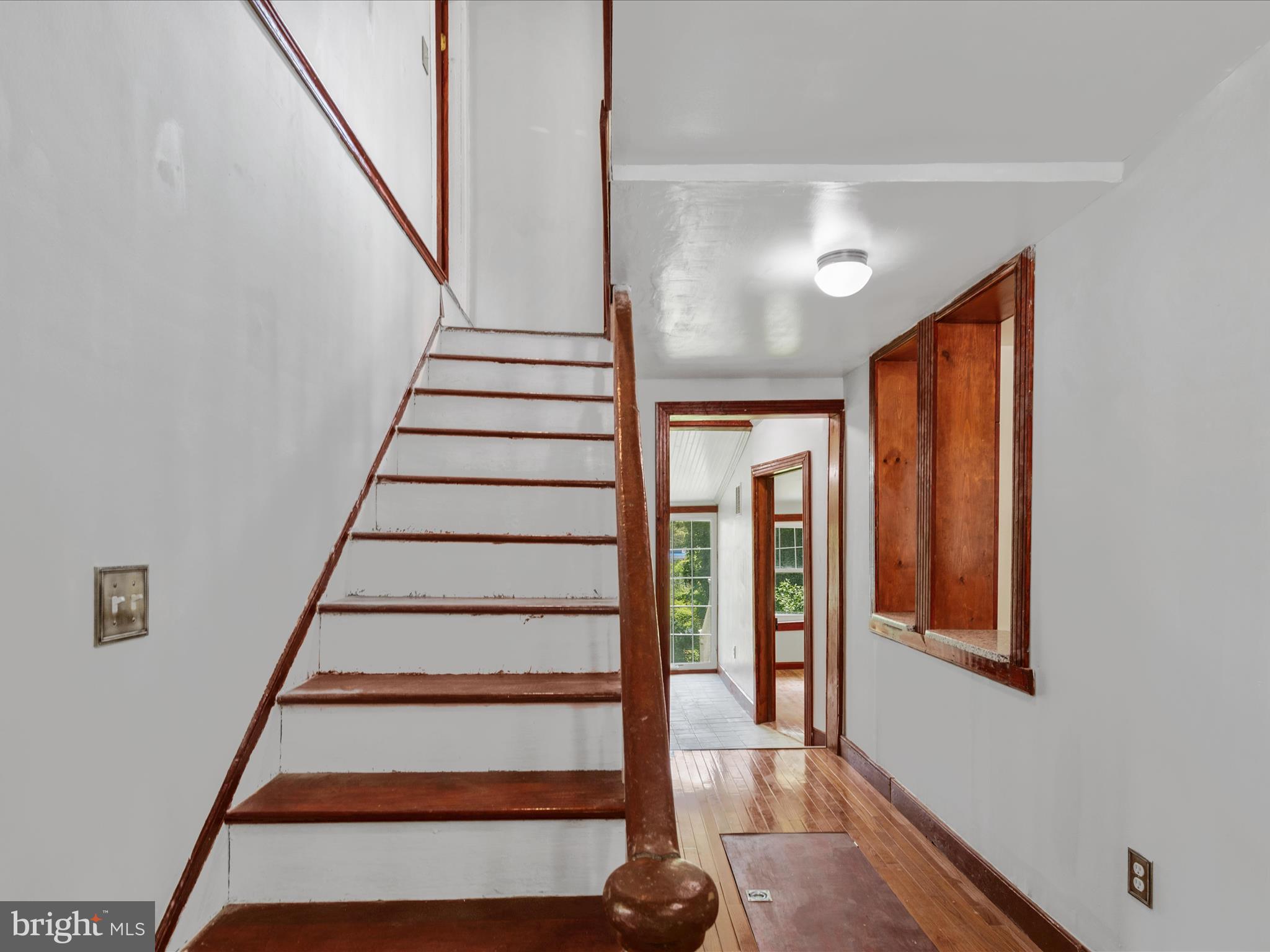 111 Broad Street Milton, DE 19968 - Photo 33 of 53 Staircase to Upper Level