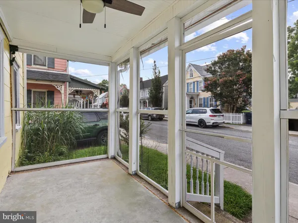 a view of a porch with furniture