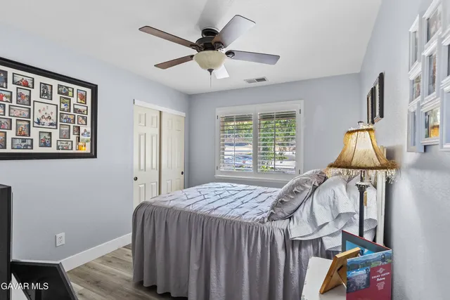 a kitchen with stainless steel appliances kitchen island granite countertop a sink and cabinets