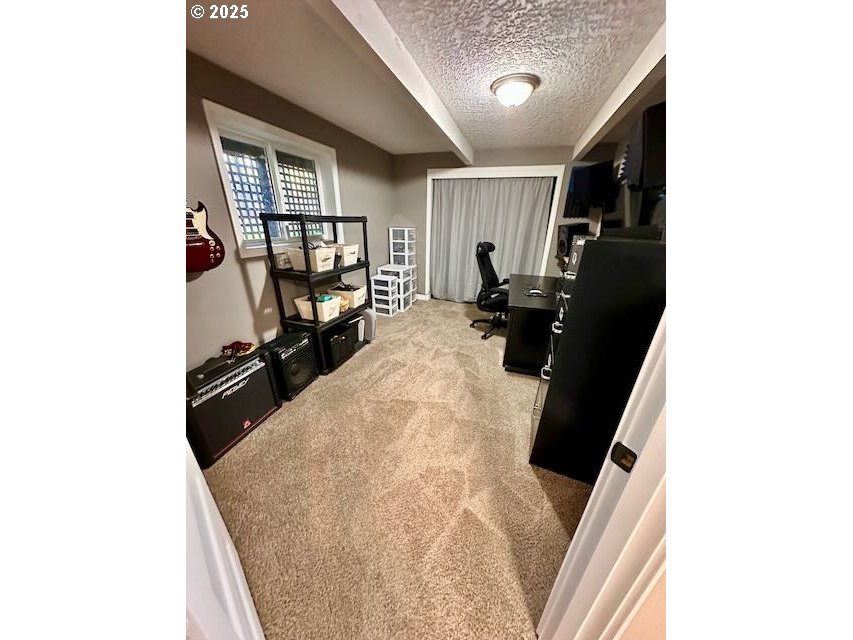 19306 Northwest 11th Avenue Ridgefield, WA 98642 - Photo 28 of 34 a living room with furniture and a window