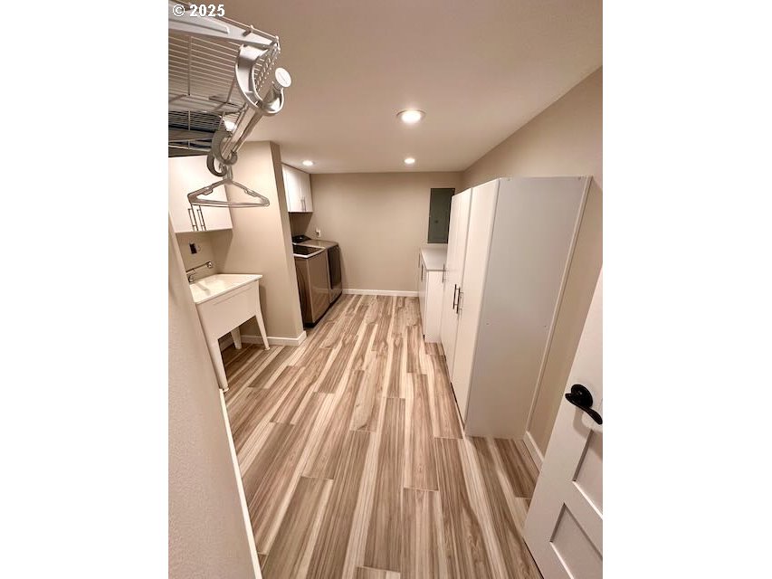 19306 Northwest 11th Avenue Ridgefield, WA 98642 - Photo 30 of 34 a view of a room with wooden floor