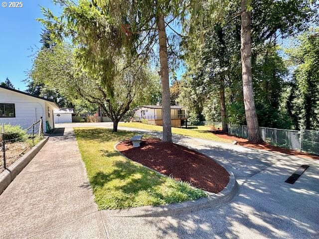 19306 Northwest 11th Avenue Ridgefield, WA 98642 - Photo 10 of 34 a view of a swimming pool with a patio