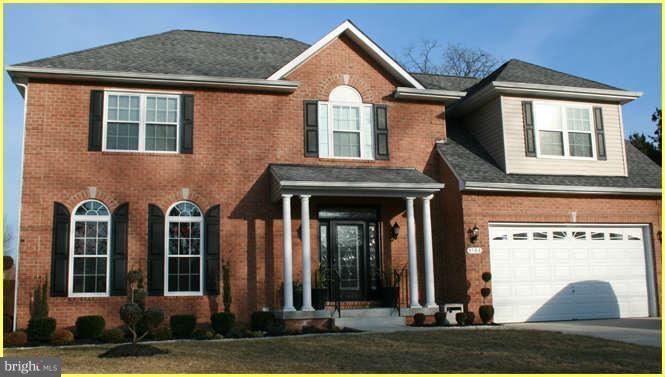 8108 Johnsam Road Clinton, MD 20735 - Photo 1 of 1 a front view of a house with a yard