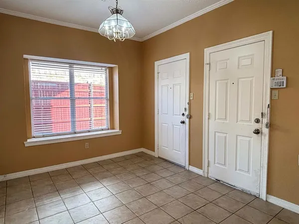 a view of an empty room with window