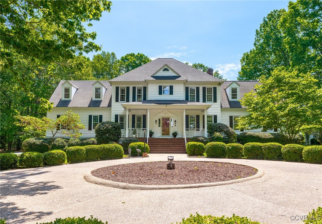 2949 Sandy Hook Road Sandy Hook, VA 23153 - Photo 1 of 49 a front view of a house with a yard and garage
