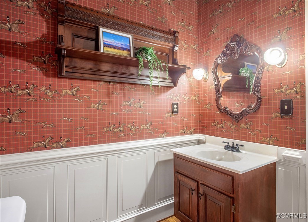 2949 Sandy Hook Road Sandy Hook, VA 23153 - Photo 22 of 49 a bathroom with a sink vanity and mirror