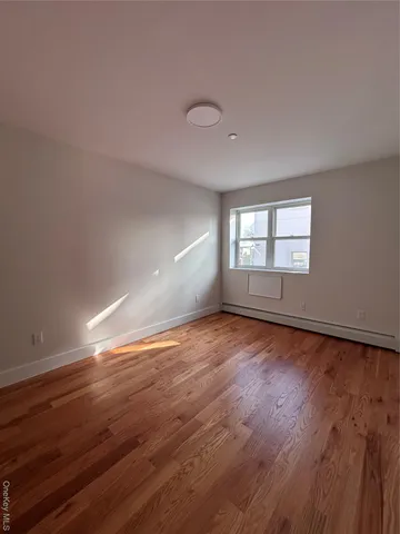 a bathroom with a granite countertop toilet sink and shower