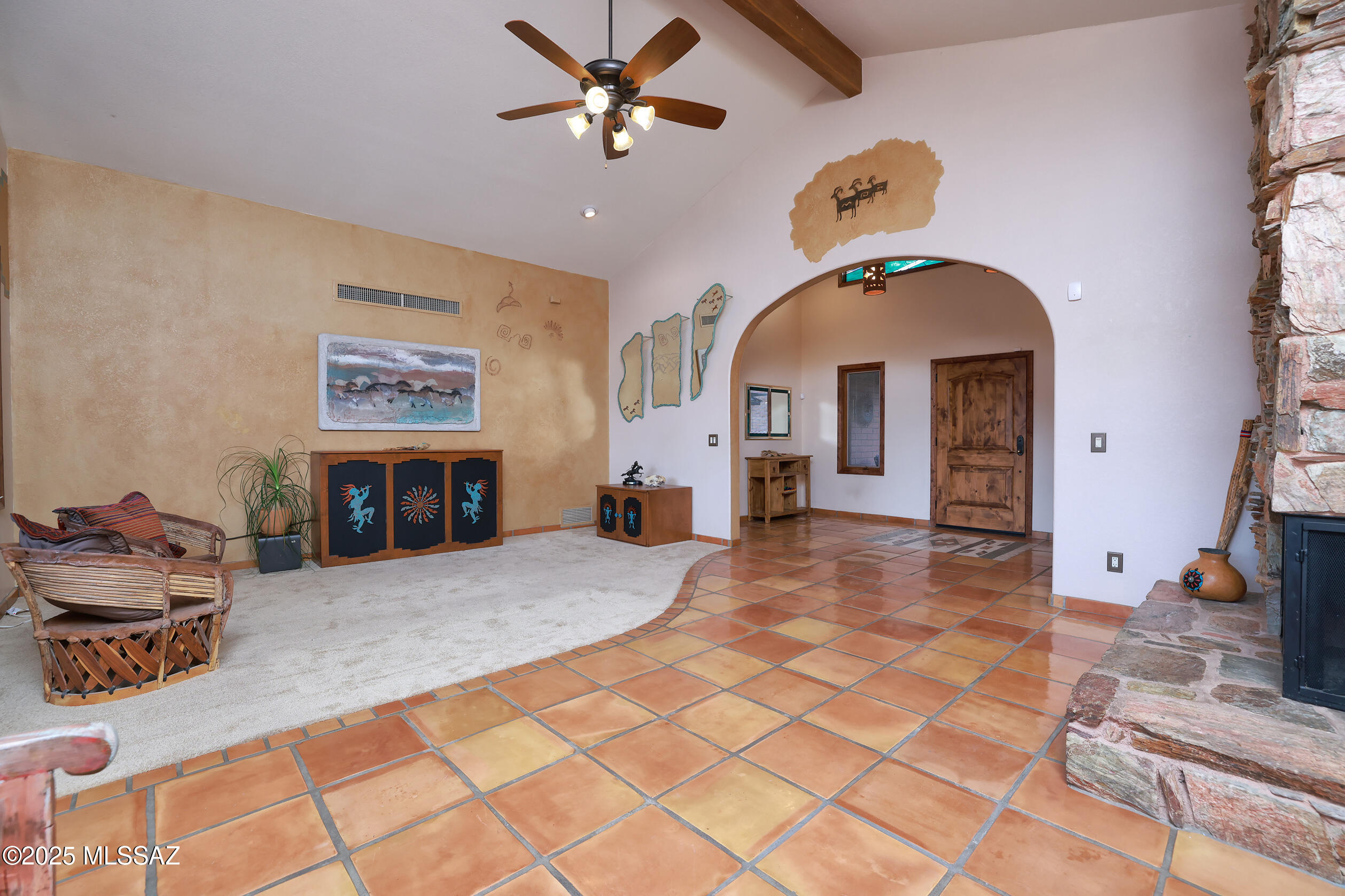 925 North Rancho Del Jefe Loop Tucson, AZ 85748 - Photo 7 of 52 a view of living room with furniture and a fireplace