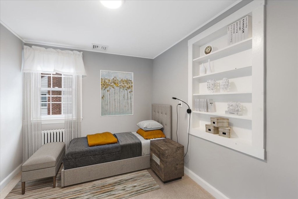5 Windsor Road Stoneham, MA 02180 - Photo 23 of 37 a bedroom with furniture and a window
