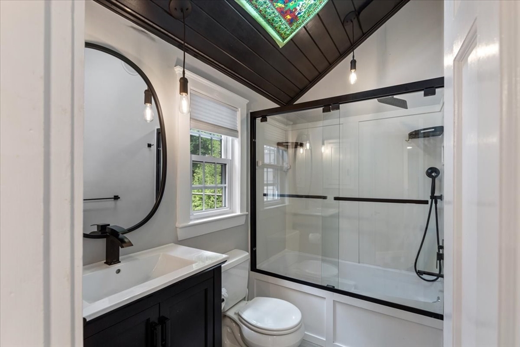 5 Windsor Road Stoneham, MA 02180 - Photo 25 of 37 a bathroom with a sink toilet and shower