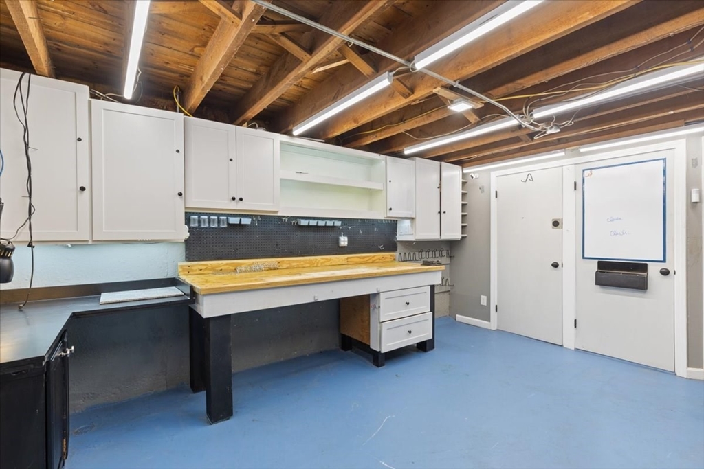 5 Windsor Road Stoneham, MA 02180 - Photo 27 of 37 a room with pool table and windows