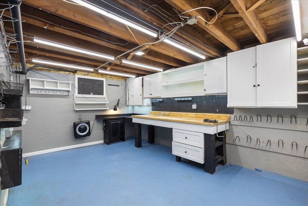 5 Windsor Road Stoneham, MA 02180 - Photo 28 of 37 a kitchen with a refrigerator and a sink