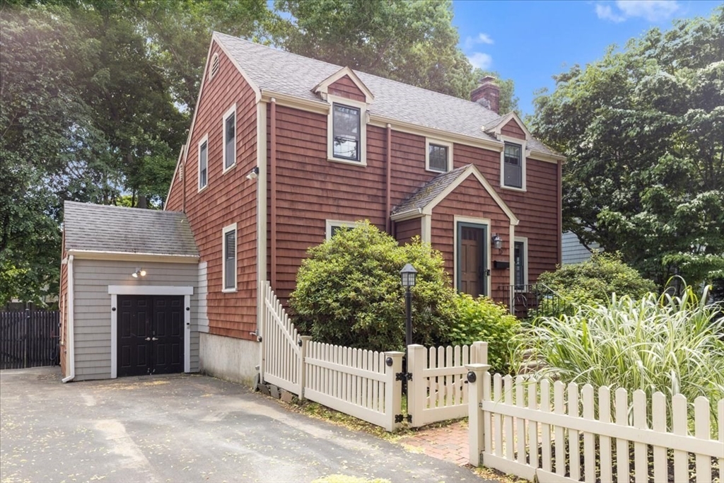 5 Windsor Road Stoneham, MA 02180 - Photo 37 of 37 a front view of a house with a yard