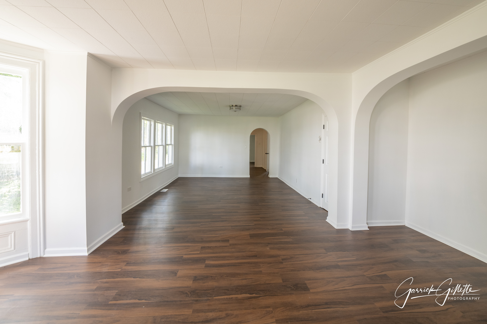 213 North Main Street Sandwich, IL 60548 - Photo 7 of 24 a view of empty room with window